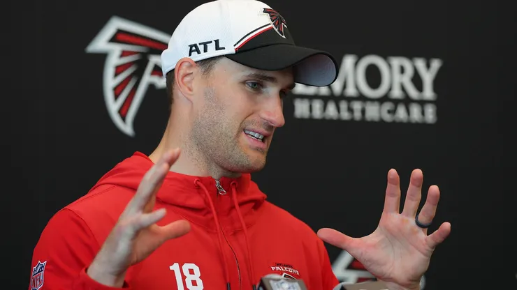 Quarterback Kirk Cousins #18 of the Atlanta Falcons speaks to the media during OTA offseason workouts at the Atlanta Falcons training facility on May 14, 2024 in Flowery Branch, Georgia.