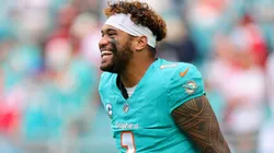 Tua Tagovailoa #1 of the Miami Dolphins smiles during warmups before the game against the San Francisco 49ers at Hard Rock Stadium on December 22, 2024 in Miami Gardens, Florida.