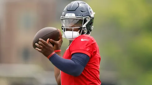 Cam Ward of the Tennessee Titans drops back to pass during Day 3 of Titans Mandatory Training Camp at Ascension Saint Thomas Sports Park on June 12, 2025 in Nashville, Tennessee.