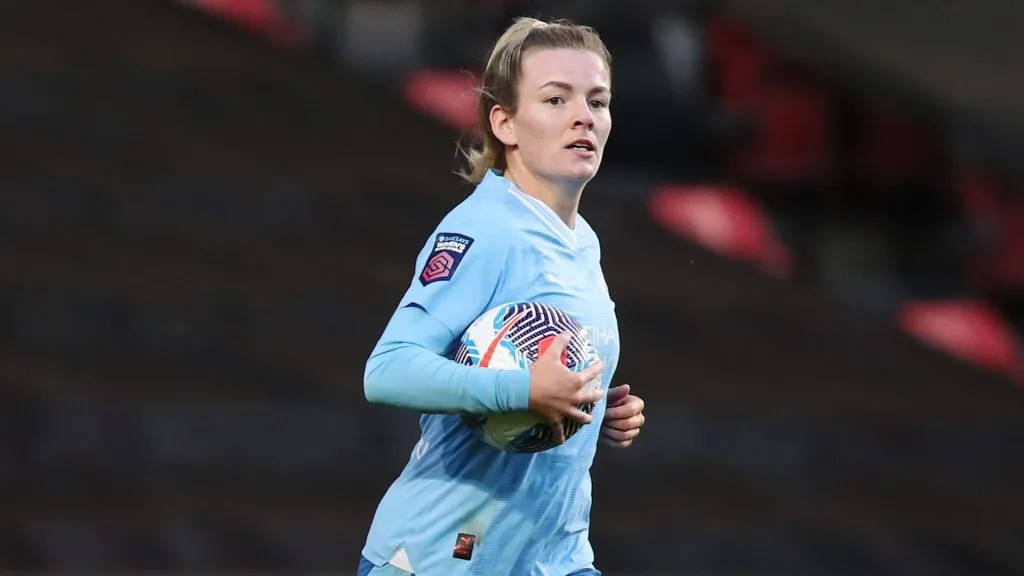 Lauren Hemp of Manchester City celebrates after Amy Rodgers scores an own goal and a Manchester City third during the Barclays Women’s Super League match in 2024. (Source: Ryan Hiscott/Getty Images)
