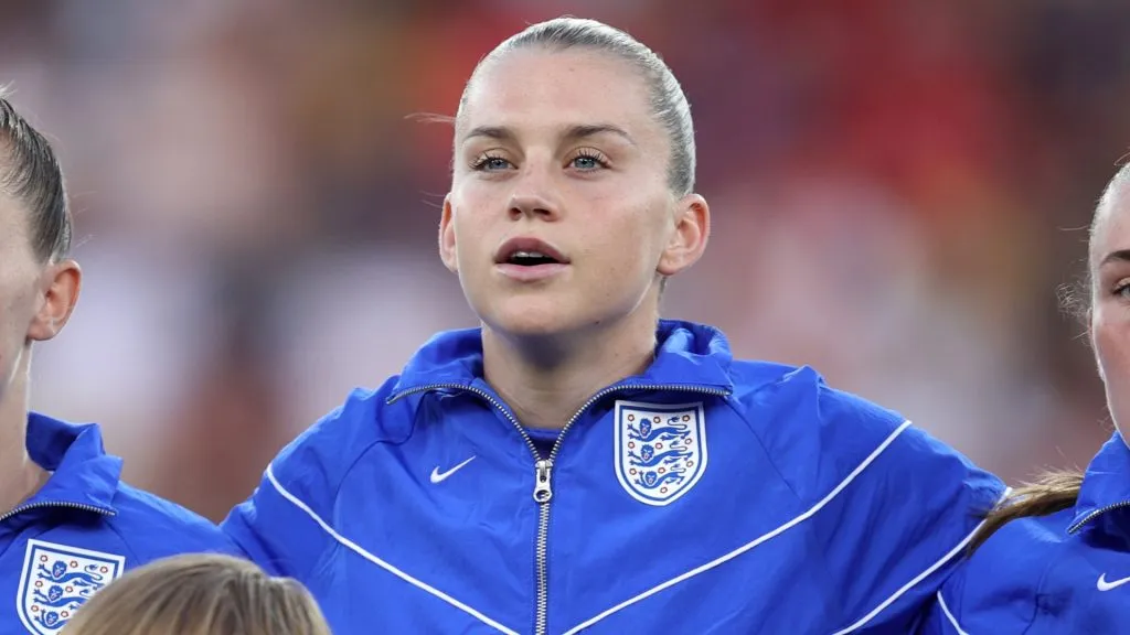 Alessia Russo of England lines up for the national anthems with the player mascots prior to the UEFA Women’s EURO 2025 Quarter-Final match. (Source: Charlotte Wilson/Getty Images)