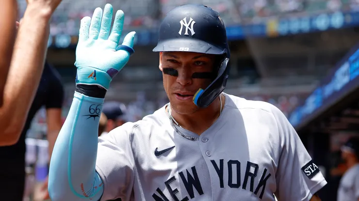 Aaron Judge #99 of the New York Yankees reacts after hitting a solo home run during the first inning against the Atlanta Braves at Truist Park on July 20, 2025 in Atlanta, Georgia.