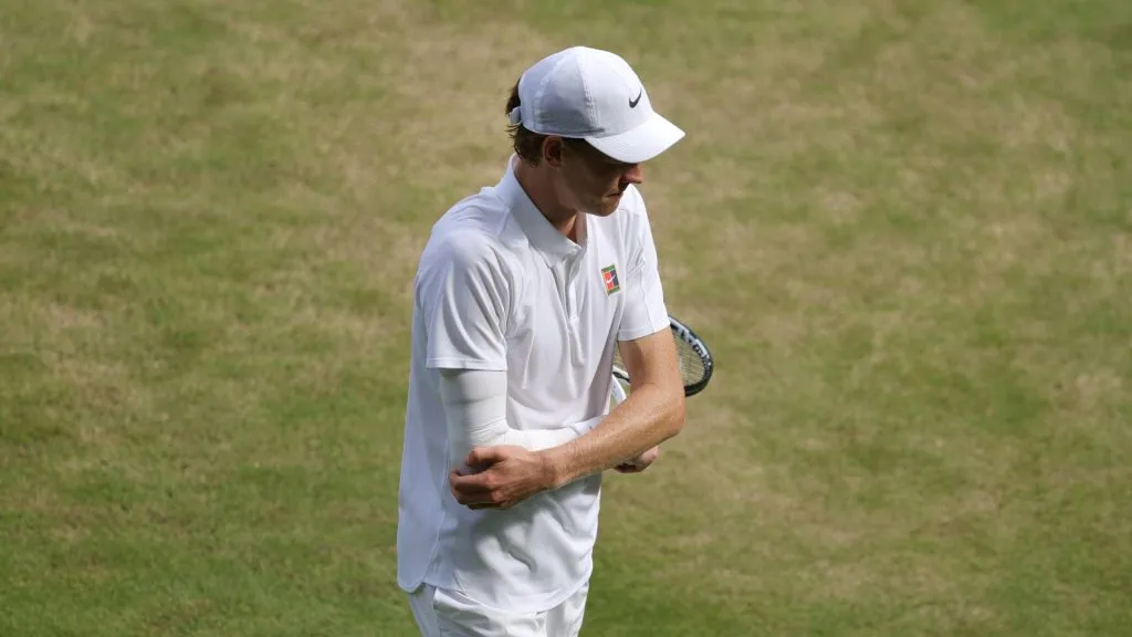 Jannik Sinner touches his elbow during Wimbledon (&nbsp;Julian Finney/Getty Images)