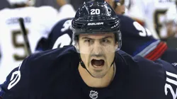 Chris Kreider #20 with the New York Rangers reacts to smelling salts prior to the game against the Florida Panthers at Madison Square Garden on October 24, 2024 in New York City.