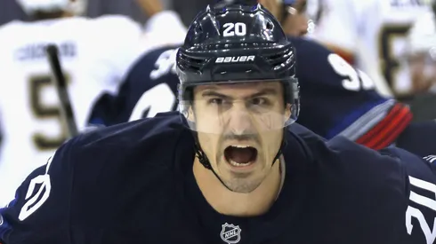 Chris Kreider #20 with the New York Rangers reacts to smelling salts prior to the game against the Florida Panthers at Madison Square Garden on October 24, 2024 in New York City.