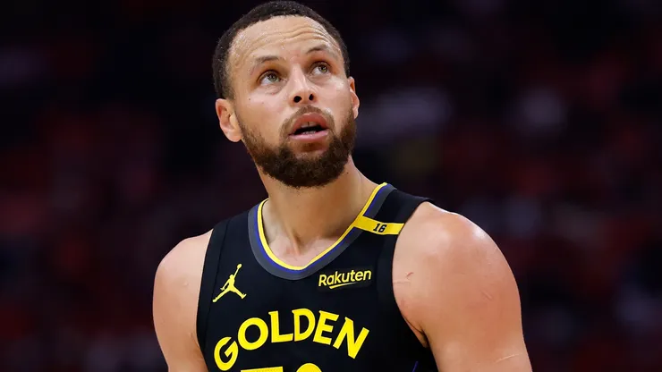 Stephen Curry #30 of the Golden State Warriors reacts during a game.
