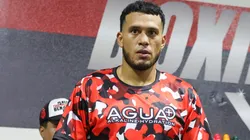 Boxer David Benavidez stands in the ring during a workout as his wife Karina Silva (R) looks on at Pound 4 Pound Gym on January 09, 2025 in Las Vegas, Nevada.