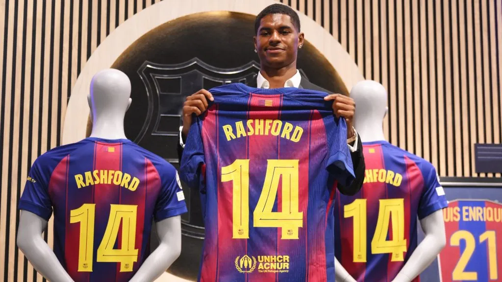 Marcus Rashford of FC Barcelona holds up his shirt during the Unveiling of New Signing Marcus Rashford at Camp Nou on July 23, 2025. (Source: David Ramos/Getty Images)