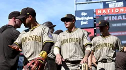 Manny Machado #13 of the San Diego Padres celebrate with teammates after a 8-1 victory against the Washington Nationals at Nationals Park on July 20, 2025 in Washington, DC.