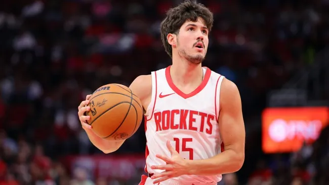 Reed Sheppard #15 of the Houston Rockets drives down court against the San Antonio Spurs during the first half of a preseason game at Toyota Center on October 17, 2024. (Source: Alex Slitz/Getty Images)