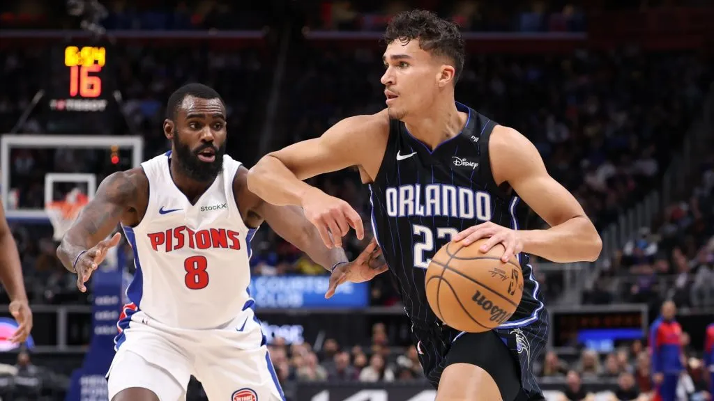 Tristan da Silva #23 of the Orlando Magic drives around Tim Hardaway Jr. #8 of the Detroit Pistons during the first half at Little Caesars Arena on January 01, 2025. (Source: Gregory Shamus/Getty Images)