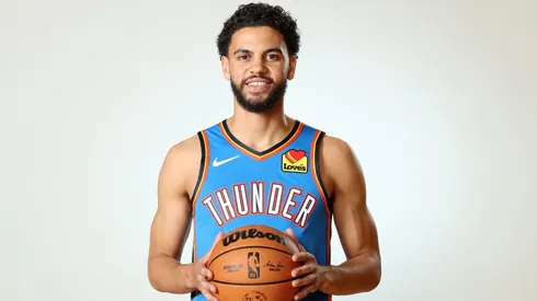 Ajay Mitchell #25 of the Oklahoma City Thunder poses for a portrait during the 2024 NBA Rookie Photo Shoot at UNLV on July 16, 2024.