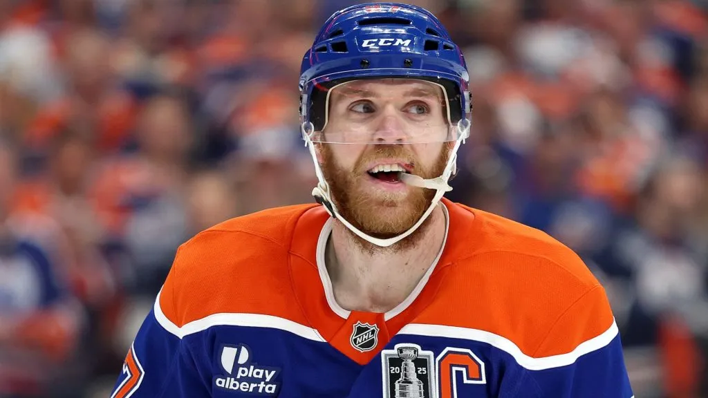 Connor McDavid smiles during a game