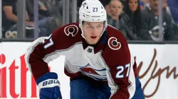 Oskar Olausson #27 with the Colorado Avalanche skates with the puck against the Vegas Golden Knights in the first period of their preseason game at T-Mobile Arena on September 28, 2021 in Las Vegas, Nevada.