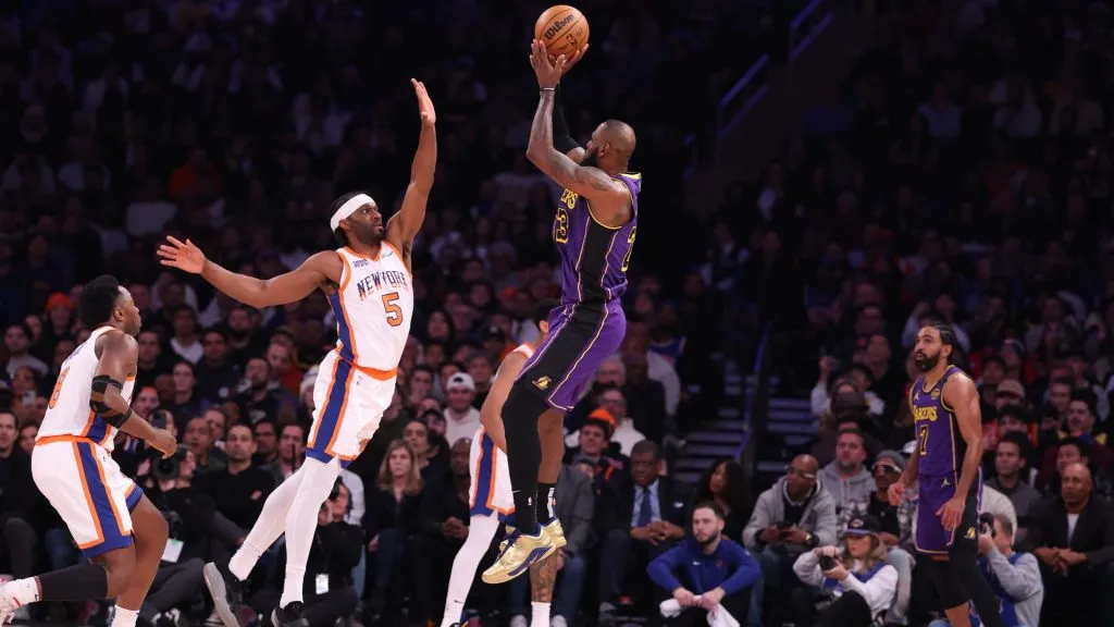 LeBron James #23 of the Los Angeles Lakers shoots against Precious Achiuwa #5 of the New York Knicks during their game at Madison Square Garden on February 01, 2025.