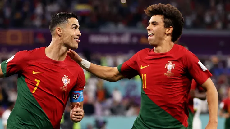 Cristiano Ronaldo of Portugal celebrates with Joao Felix after scoring their team's first goal via a penalty during the FIFA World Cup Qatar 2022.