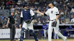 The New York Yankees celebrate the end of the first inning against the Toronto Blue Jays.