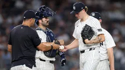 Cam Schlittler #31 of the New York Yankees is taken out of their game against the Tampa Bay Rays by manager Aaron Boone.