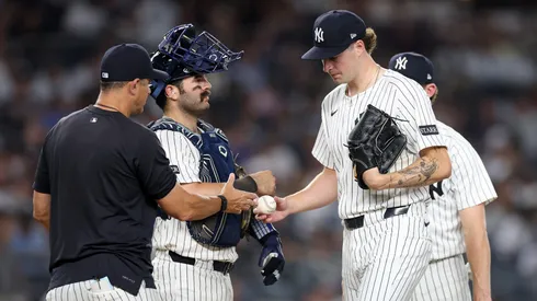 Cam Schlittler #31 of the New York Yankees is taken out of their game against the Tampa Bay Rays by manager Aaron Boone.