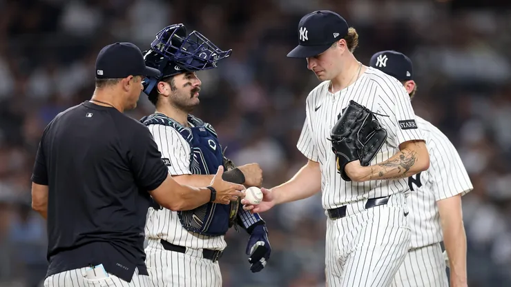 Cam Schlittler #31 of the New York Yankees is taken out of their game against the Tampa Bay Rays by manager Aaron Boone.