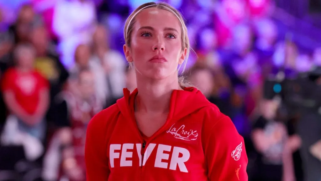 Lexie Hull #10 of the Indiana Fever stands on the court as the United States national anthem is performed before a game against the Las Vegas Aces at T-Mobile Arena on June 22, 2025. (Source: Ethan Miller/Getty Images)