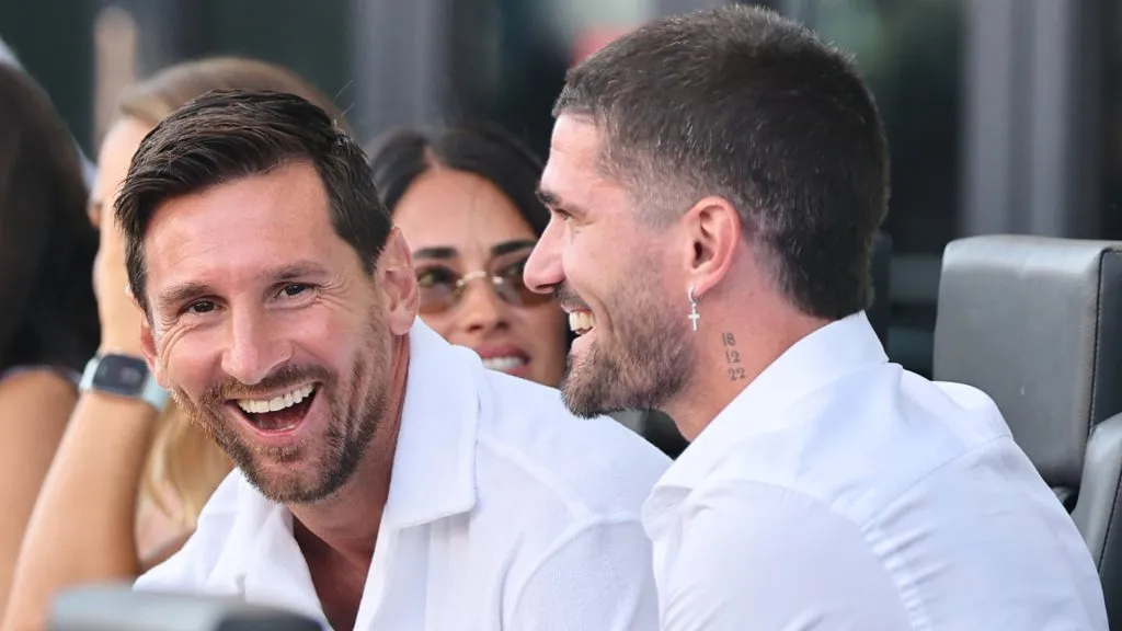 Lionel Messi #10 of Inter Miami CF and Rodrigo de Paul, new Inter Miami CF signing smile on the bench during the MLS match between Inter Miami CF and FC Cincinnati at Chase Stadium on July 26, 2025 in Fort Lauderdale, Florida.