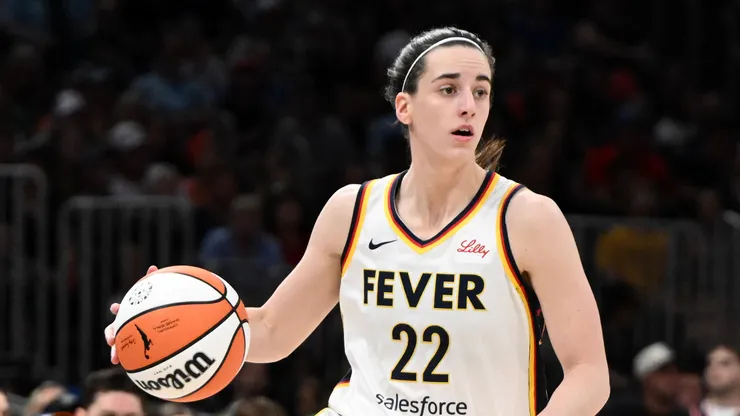 Indiana Fever star Caitlin Clark drives to the basket against the Connecticut Sun