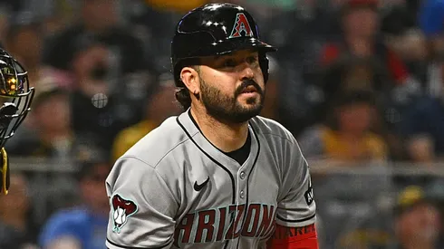 Eugenio Suárez #28 of the Arizona Diamondbacks hits a run scoring sacrifice fly ball in the eleventh inning during the game against the Pittsburgh Pirates at PNC Park on July 25, 2025 in Pittsburgh, Pennsylvania.