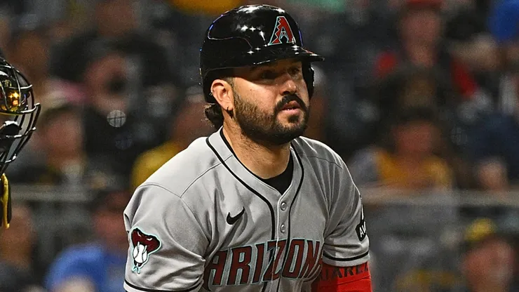 Eugenio Suárez #28 of the Arizona Diamondbacks hits a run scoring sacrifice fly ball in the eleventh inning during the game against the Pittsburgh Pirates at PNC Park on July 25, 2025 in Pittsburgh, Pennsylvania.