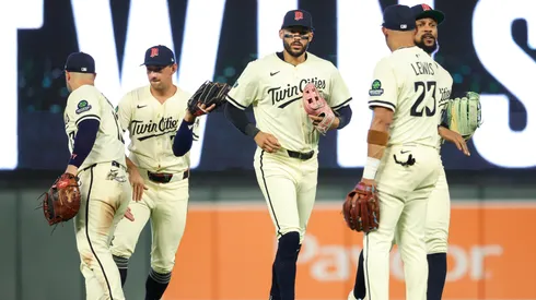 Minnesota Twins players celebrate their teams win against the Washington Nationals.