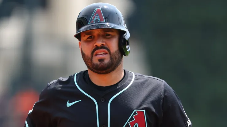 Eugenio Suárez #28 of the Arizona Diamondbacks heads to the dugout after a third inning at bat against the Detroit Tigers.