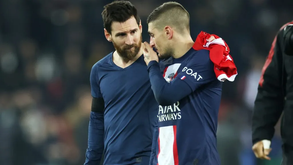 Lionel Messi speaks with Marco Verratti of Paris Saint-Germain after the UEFA Champions League round of 16 leg one match against FC Bayern Munich. (Alex Grimm/Getty Images)
