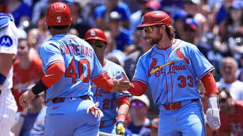 Willson Contreras #40 of the St. Louis Cardinals celebrates scoring with teammate Brendan Donovan #3.