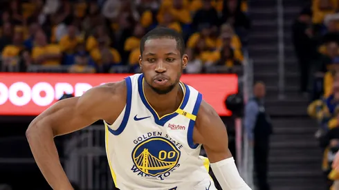 Jonathan Kuminga #00 of the Golden State Warriors dribbles the ball against the Houston Rockets in Game Three of the Western Conference First Round NBA Playoffs