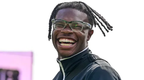 Former Colorado Buffaloes player Travis Hunter claps on the field during a ceremony where his jersey number was retired before the Black and Gold Spring Game at Folsom Field on April 19, 2025 in Boulder, Colorado.
