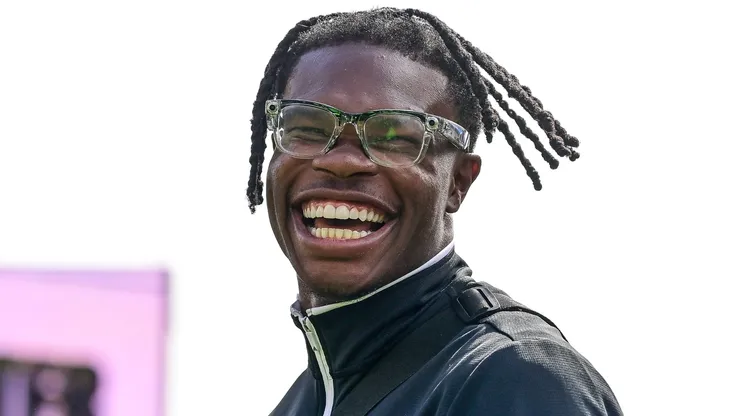 Former Colorado Buffaloes player Travis Hunter claps on the field during a ceremony where his jersey number was retired before the Black and Gold Spring Game at Folsom Field on April 19, 2025 in Boulder, Colorado.