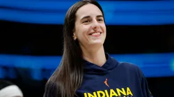 Caitlin Clark #22 of the Indiana Fever looks on before the game against the Dallas Wings at American Airlines Center on August 1, 2025 in Dallas, Texas.