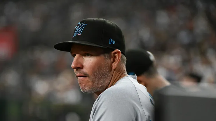 Manager Clayton McCullough #86 of the Miami Marlins looks on from the dugout against the Arizona Diamondbacks during the third inning at Chase Field on June 28, 2025 in Phoenix, Arizona.