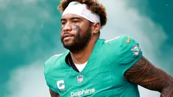 Tua Tagovailoa #1 of the Miami Dolphins runs onto the field during team introductions.