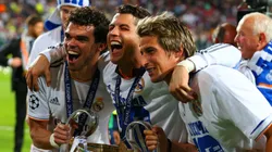 Pepe, Gareth Bale and Fabio Coentrao of Real Madrid celebrate with the Champions League trophy after the UEFA Champions League Final between Real Madrid and Atletico de Madrid.