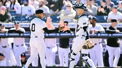 Marcus Stroman #0 and Preston Claiborne #79 of the New York Yankees celebrate in the middle of the first inning against the Tampa Bay Rays.