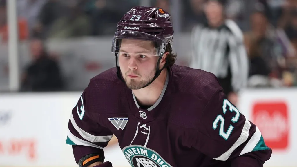 Mason McTavish #23 of the Anaheim Ducks skates to a puck during the second period of a game against the Minnesota Wild at Honda Center on March 19, 2024 in Anaheim, California.