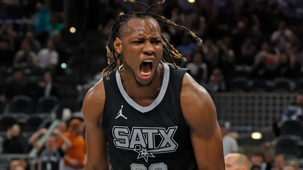 Charles Bassey #28 of the San Antonio Spurs reacts after a dunk against the Oklahoma City Thunder.