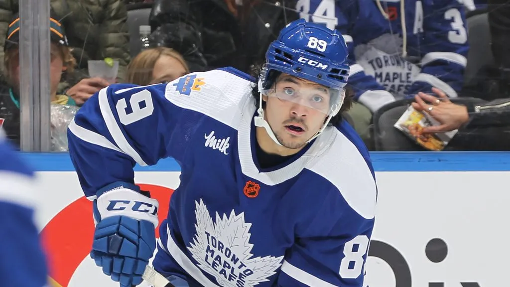 Nicholas Robertson #89 of the Toronto Maple Leafs controls the puck against the San Jose Sharks during an NHL game at Scotiabank Arena on November 30, 2022 in Toronto, Ontario, Canada.