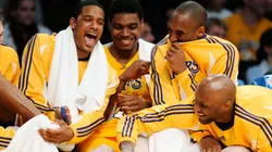 Los Angeles Lakers players Lamar Odom #7, right, Kobe Bryant #24, second right, and Andrew Bynum # 17 joke with Trevor Ariza #3.