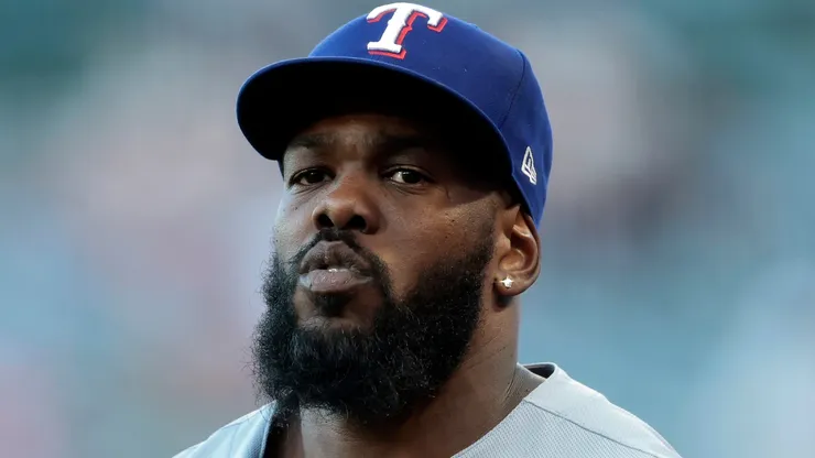 Adolis García #53 of the Texas Rangers on field against the Los Angeles Angels in the fourth inning at Angel Stadium of Anaheim on July 28, 2025.