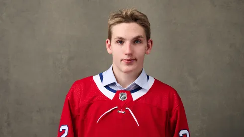 Lane Hutson, #62 pick by the Montreal Canadians, poses for a portrait during the 2022 Upper Deck NHL Draft at Bell Centre on July 08, 2022 in Montreal, Quebec, Canada.