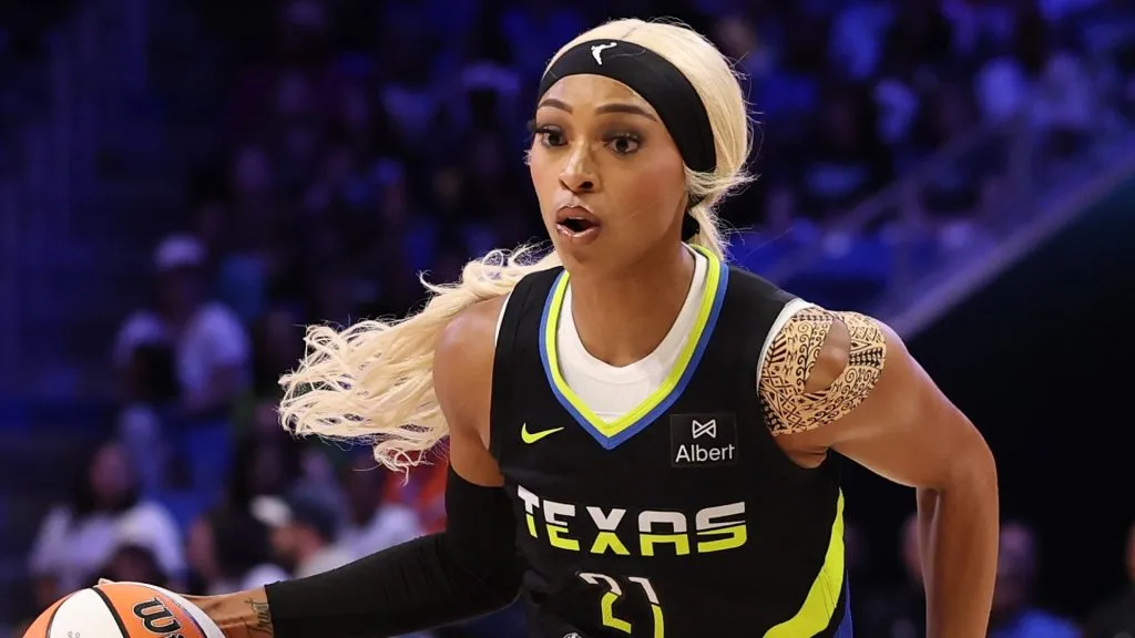 DiJonai Carrington #21 of the Dallas Wings drives to the basket during the first half of a game against the Las Vegas Aces at College Park Center on July 27, 2025. (Source: Stacy Revere/Getty Images)