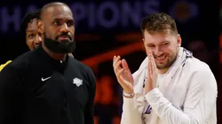 LeBron James #23 and Luka Doncic #77 of the Los Angeles Lakers react at the end of the fourth quarter of a game against the Utah Jazz.