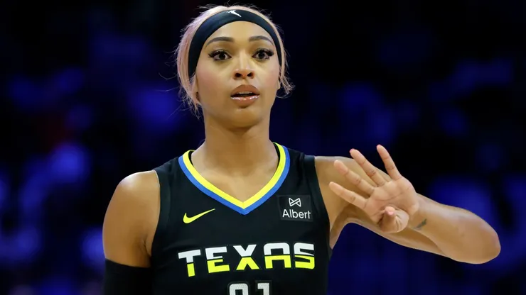 DiJonai Carrington #21 of the Dallas Wings calls a play against the Minnesota Lynx during the first half at College Park Center on June 8, 2025.